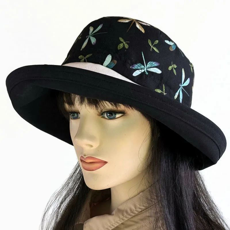 Sunblocker with lovely dragonfly print with black base, adjustable fit, wide brim